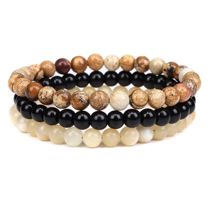 Detailed view of 6mm natural stone beaded bracelet set with tiger eye and agate beads