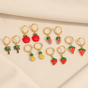 Close-up of 18K gold-plated hoop earrings with various colorful fruit enamel charms
