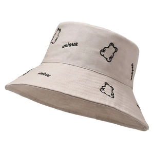 Beige cotton bucket hat with bear embroidery and unique print for summer sun protection