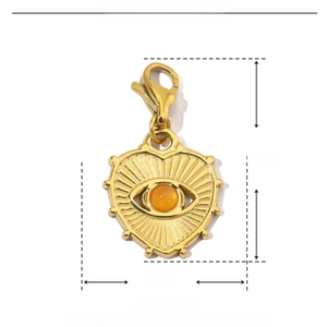 Detail showing dimensions of heart-shaped gold stainless steel pendant with orange stone