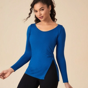 Slim fit royal blue long sleeve yoga top with crew neck and side ruched slit detail