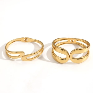Polished 18k gold plated stainless steel spring open cuff bracelets with hollow design