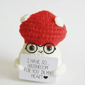 Handmade knitted monster with mushroom hat and emotional support card for stress relief