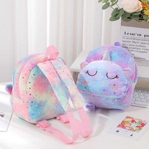 Unicorn plush backpack with tie-dye pattern and gold stars for girls and kids