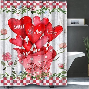 Detail showing a Valentine hearts shower curtain with pink gift box and red balloons