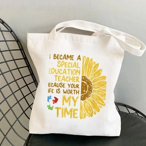 Minimalist white canvas tote bag with Special Education Teacher print and sunflower