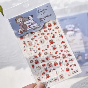 Detail of 3D embossed nail art stickers with cute bear and strawberry design motifs