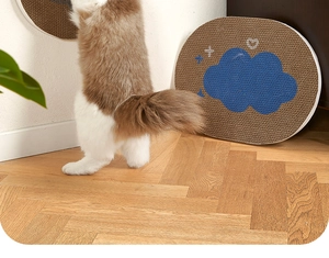 Wall-mounted oval corrugated cardboard cat scratcher with cute blue cloud patterns