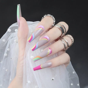 Colorful wavy pop-art long coffin press-on nails with glossy finish and vibrant contrast