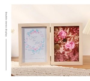 Deep wood frame with double stereo display featuring preserved pink roses and hydrangea
