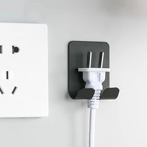 Matte black wall-mounted power plug hook for bathroom razor holder and cable storage