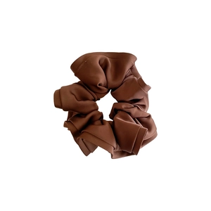 Brown vintage satin scrunchie with soft fabric pleats and ruffled flower bud design