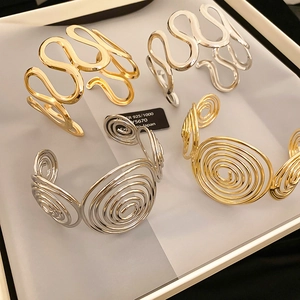 Artistic wave and spiral 925 silver bangles in gold and silver finishes
