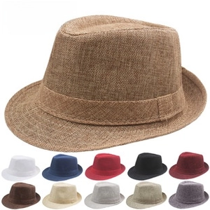 Detailed view of woven paper straw jazz hats in eleven different color variations