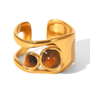 Detail of gold titanium steel open ring inlaid with two round tiger eye stones