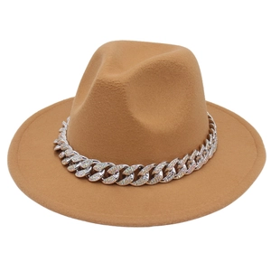 Detailed view of the khaki felt fedora featuring a thick silver chain with rhinestones