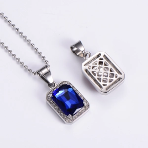 Iced out hip hop necklace with rectangular blue sapphire pendant and silver chain