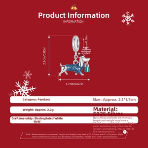 Detail of S925 sterling silver dachshund charm wearing a festive Christmas hat and sweater