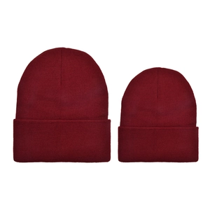 Detailed knit texture and folded cuff of burgundy winter hats in two size variations