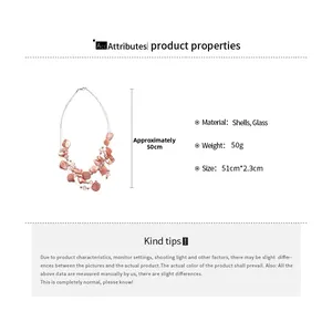 Detail showing pink shell fragments and glass beads on a multi-layer necklace with measurements