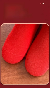 Close-up of seamless toe craftsmanship on red combed cotton crew socks for women