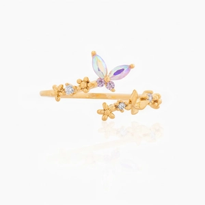 Detailed macro shot of an open butterfly ring with colorful opal wings and crystals