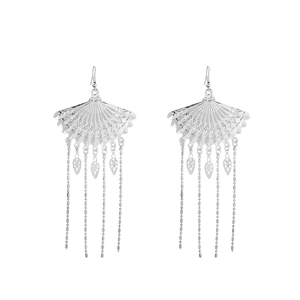 Detailed view of silver ethnic earrings featuring fan-shaped design and tassel pendants