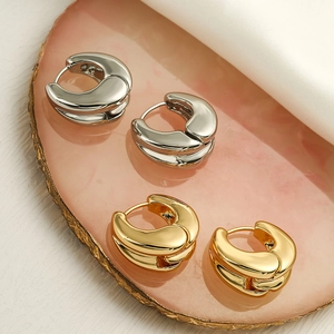 Irregular geometric hoop earrings in gold and silver plating with high polish finish
