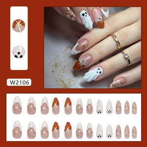 3D Halloween press on nails with ghost and pumpkin designs in 24 piece nail kit