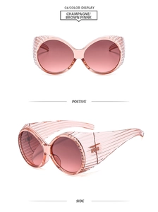 Detail view of champagne and pink round Y2K sunglasses with luxury stripe textures