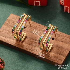 Golden C-shaped hoop earrings with colorful gemstones and 2024 Christmas star motifs