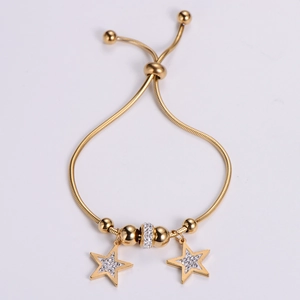 Adjustable 18k gold plated snake chain bracelet featuring sparkling star pendants