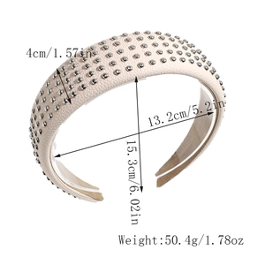 Detail showing the cream faux leather headband with silver studs and product dimensions