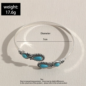 Detail view of vintage bohemian silver cuff with turquoise inlay and 17.6g weight label
