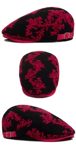 Detailed views of vintage black cotton beret with red floral jacquard and side strap buckle