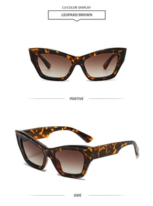 Detail view of leopard print cat-eye sunglasses with brown gradient lenses and glossy finish