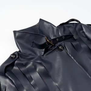 Detail of high collar leather coat with strap buckle and epaulettes on shoulder