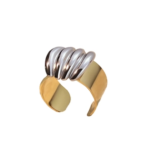 Two-tone 18k gold and silver stainless steel ring with a chunky pleated texture design