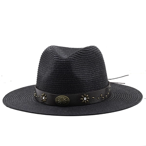 Black fedora straw hat with brown leather band and vintage metal floral rivets