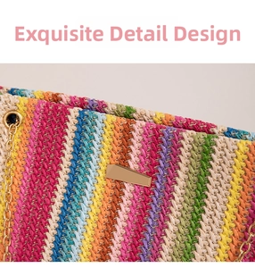 Close-up of vibrant multi-color woven straw bucket bag with gold metal lock and chain strap