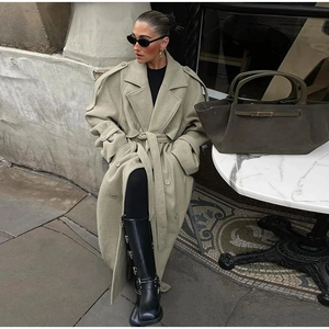 Minimalist beige wool blend overcoat with oversized silhouette and matching waist belt