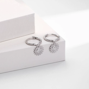 Detailed close-up of S925 sterling silver sunflower earrings with zircon inlays