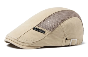 Detail of beige summer mesh flat cap showing breathable fabric and side metal buckle
