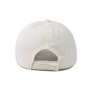Detail of off-white waffle-knit baseball cap with adjustable Velcro back strap