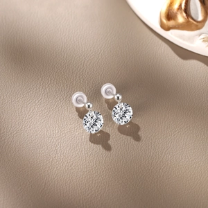 Macro shot of S925 sterling silver stud earrings with round-cut clear cubic zirconia