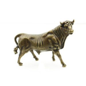Retro bronze bull figurine with muscular details for home and office desktop decor