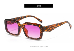 Detail view of square tortoiseshell sunglasses with pink purple gradient lenses