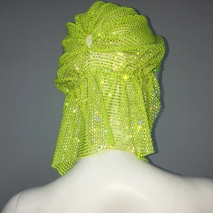 Rear view detail of neon green rhinestone mesh turban with high-shine crystal grid design