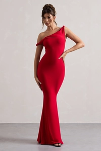 Detail of elegant red one-shoulder evening gown with fitted waist and fishtail hem