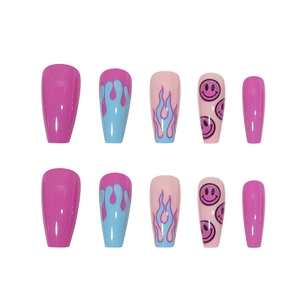 Detail of medium-long ballet nails featuring pink, blue flames and smiley face patterns